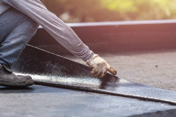 Professional Basement Waterproofing technician working in Mukwonago, WI